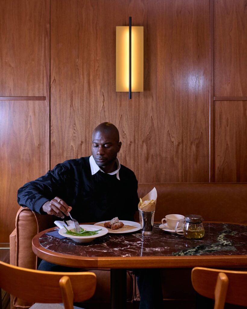 Folu Odimayo eats a meal at Sir Devonshire Square Hotel in London, UK