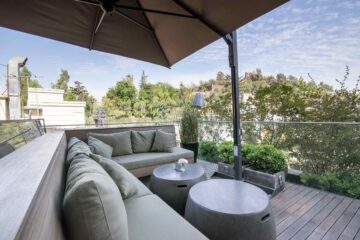 Outdoor seating on the rooftop terrace at Hotel Magnolia, Santiago, Chile