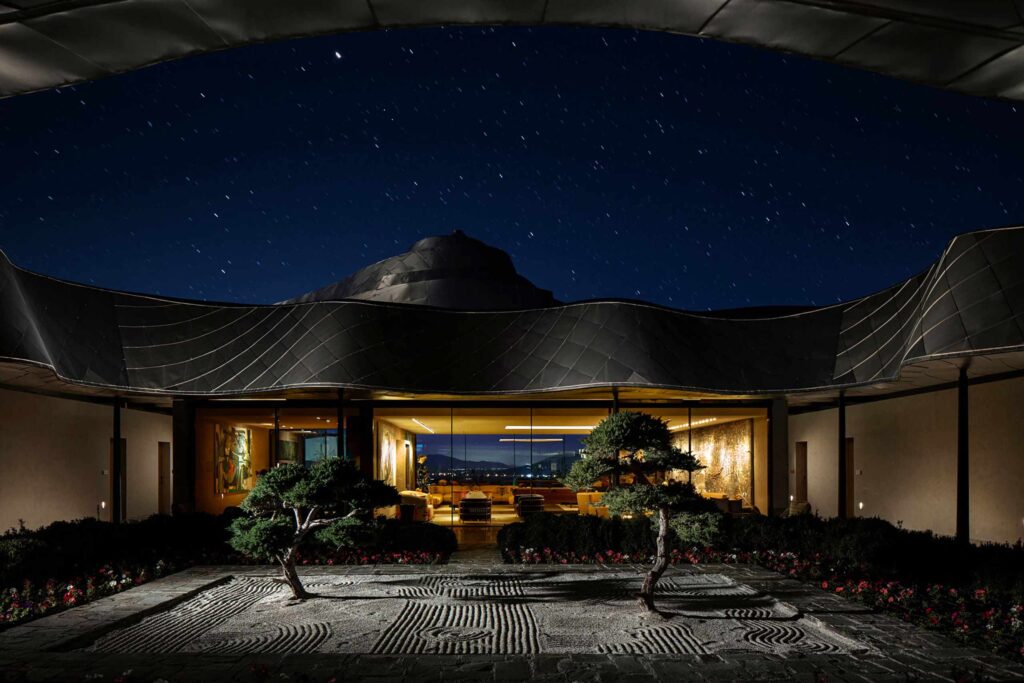 Stars twinkle above the Japanese zen garden in the courtyard of Vik Chile, Millahue Valley, Cachapoal, Chile