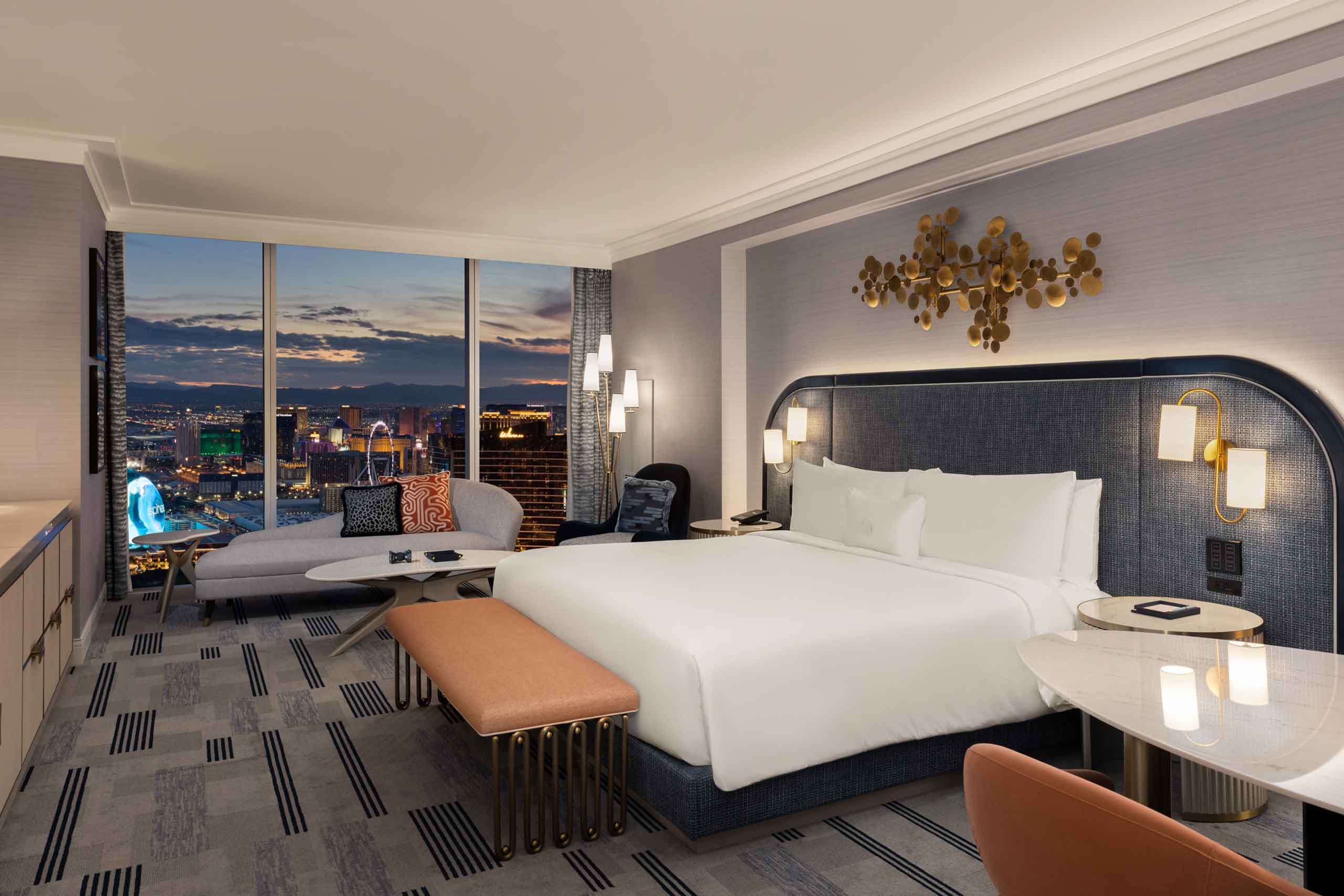 Gold King Room at the Fontainebleau Las Vegas featuring contemporary decor, bed and view overlooking the Strip