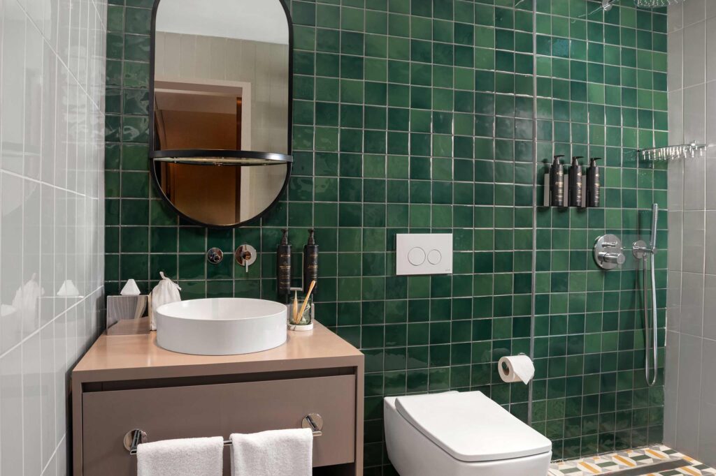 A green-tiled bathroom wall at Casa Foscolo, a Member of Design Hotels, Istanbul, Türkiye