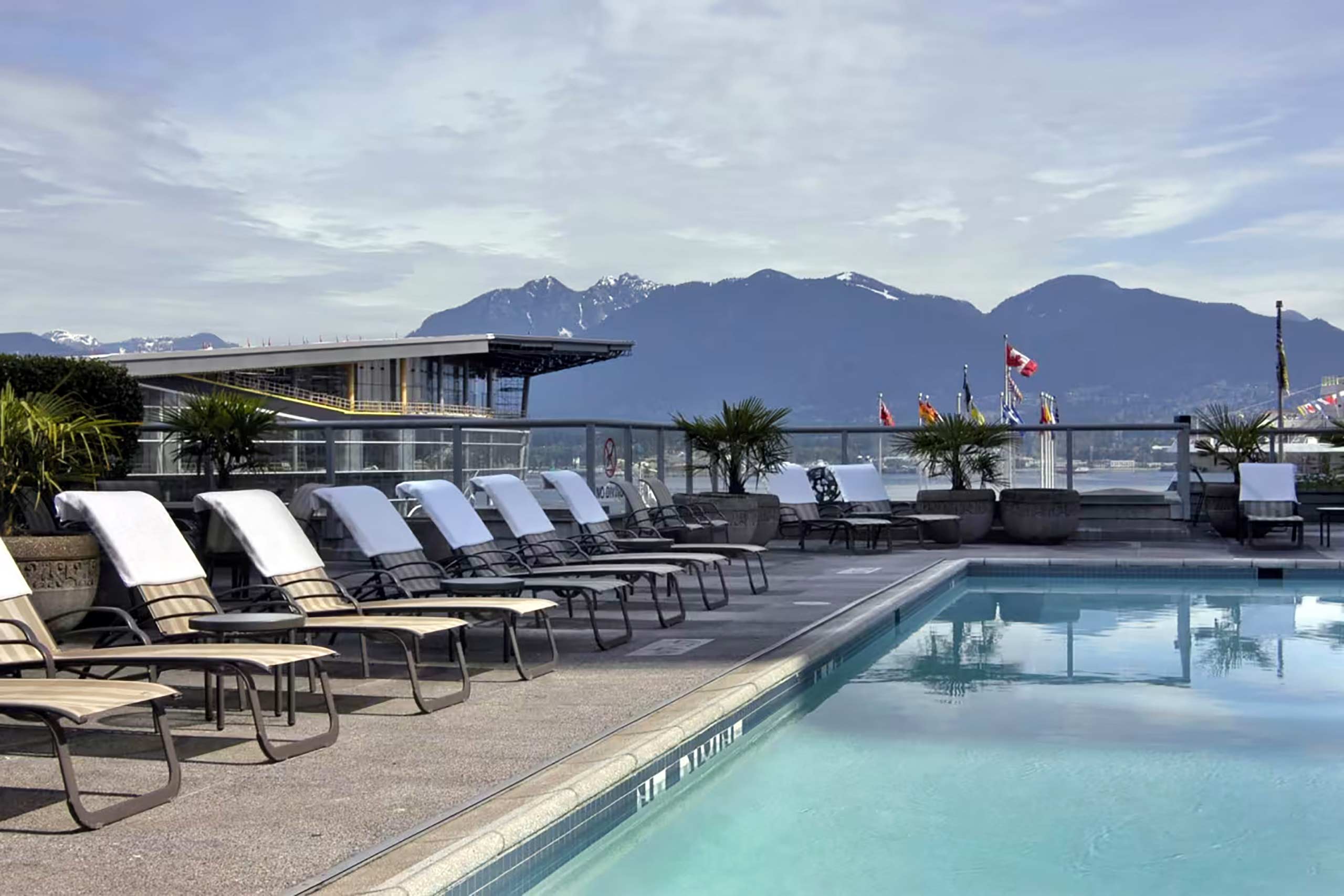 Rooftop pool with a view of Vancouver Harbour at Fairmont Waterfront, Vancouver, Canada