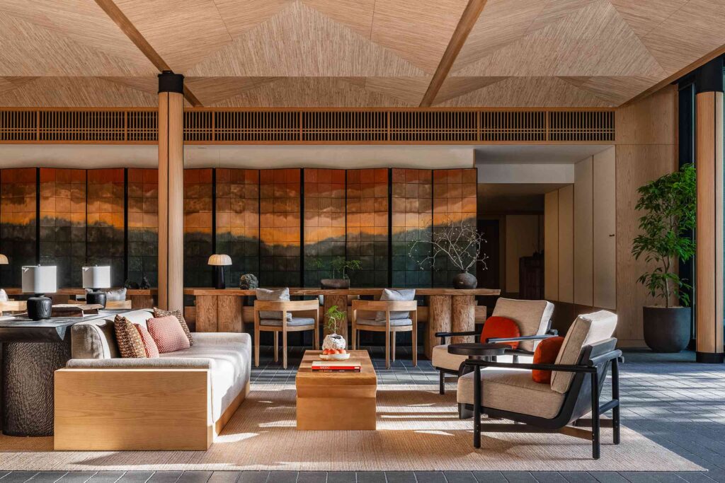 A lounge area featuring a room divider and wabi sabi-style decorations at Six Senses Kyoto