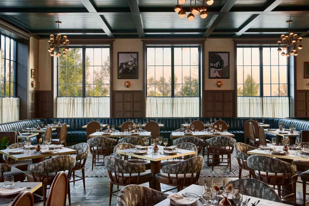 Tables are set in front of large windows at Granddam Restaurant in Lexington, Kentucky, USAS