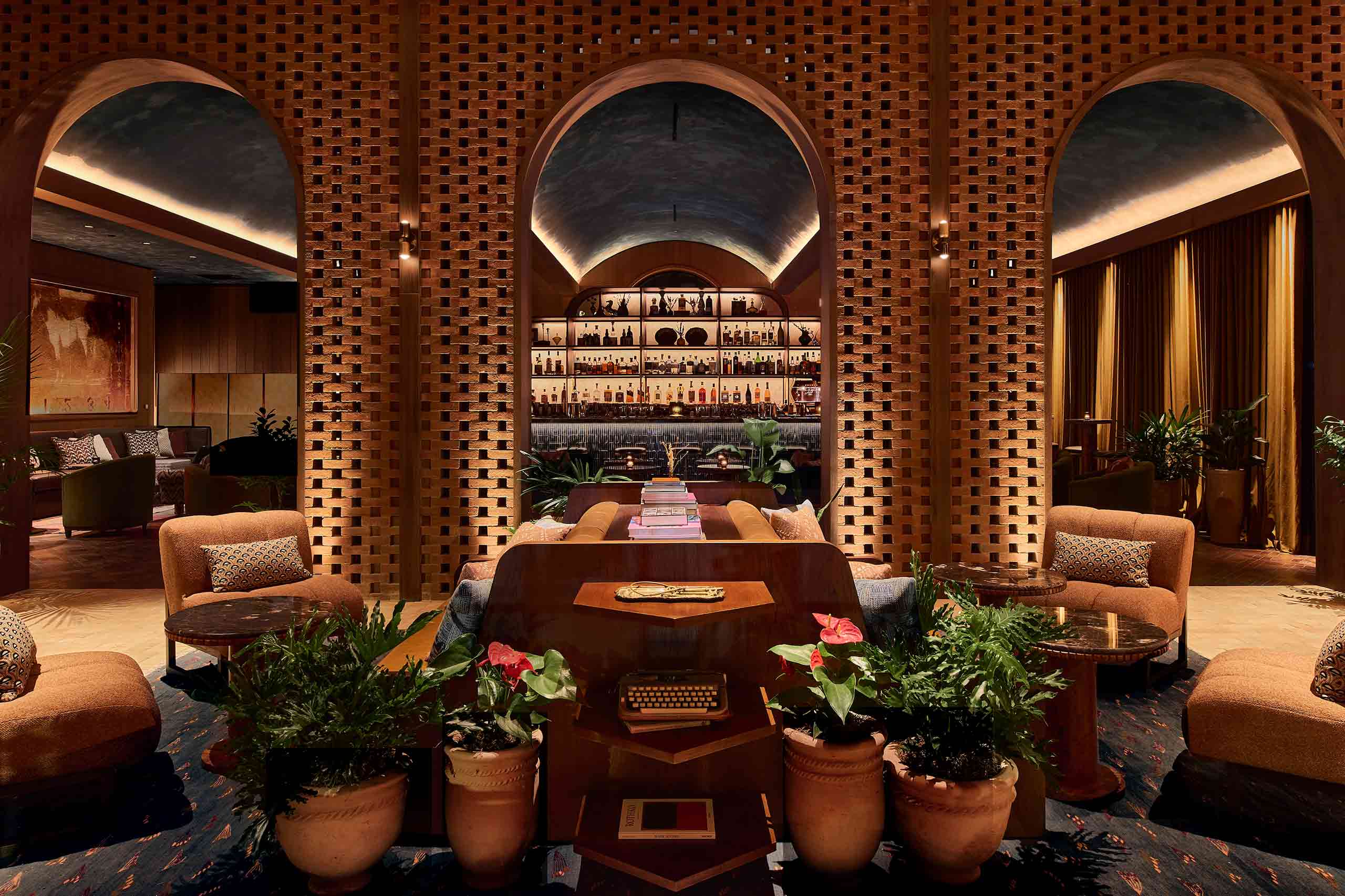 Three arches provide a view into the dimly lit bar at The Manchester, Lexington, Kentucky, USA