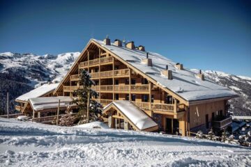 Exterior view of the chalet-style architecture of Antarès Méribel, Méribel, France