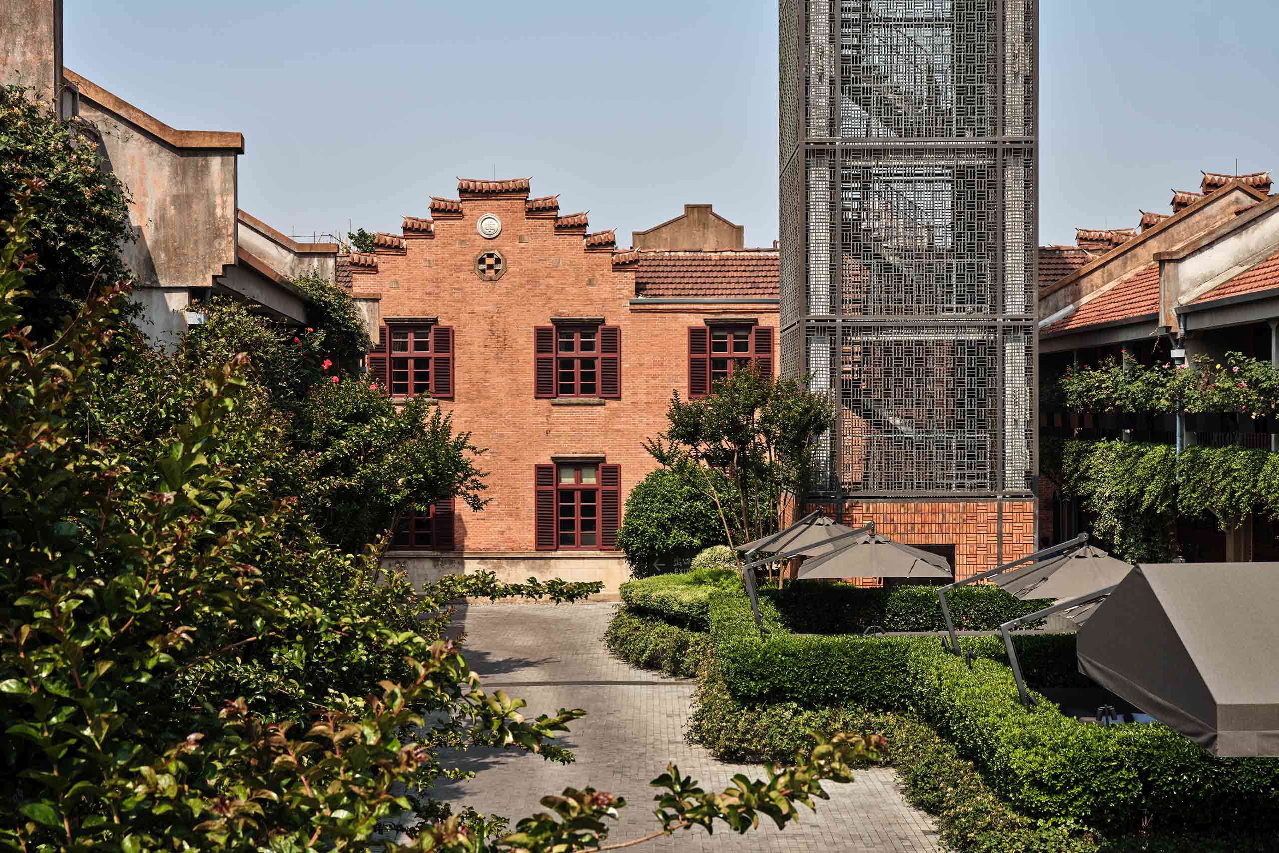 The shinkumen-style exterior and ivy-covered courtyard of Capella Shanghai, Jian Ye Li, Shanghai, China