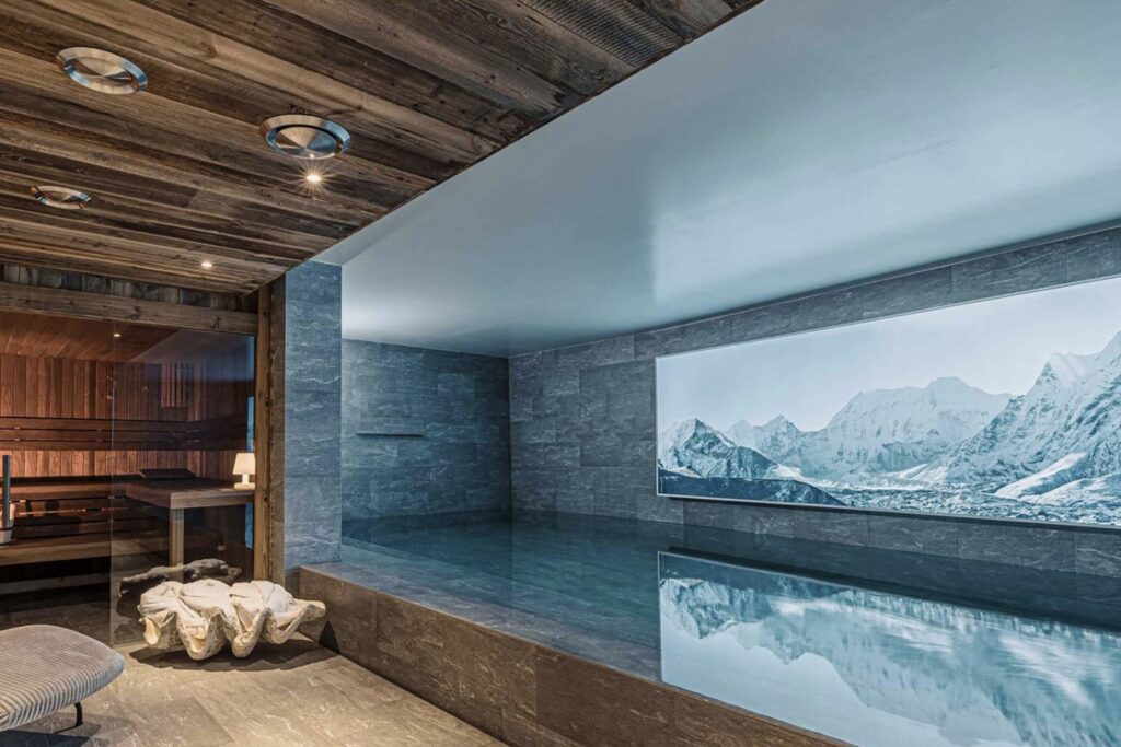 The Luxury Chalet Company chalet with sauna and plunge pool with a view of the mountains