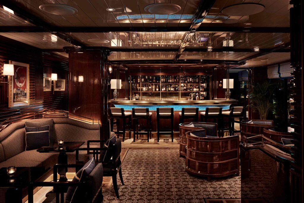 The Topside Bar with its wood-panelled walls and yachting-inspired interiors at The Peninsula, Istanbul, Türkiye