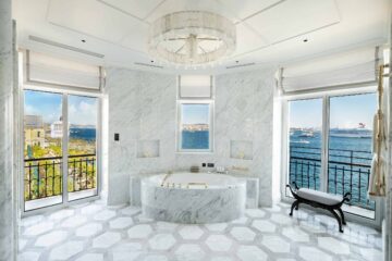 A bathtub with views over the Bosphorus, part of The Peninsula Suite at The Peninsula, Istanbul, Türkiye