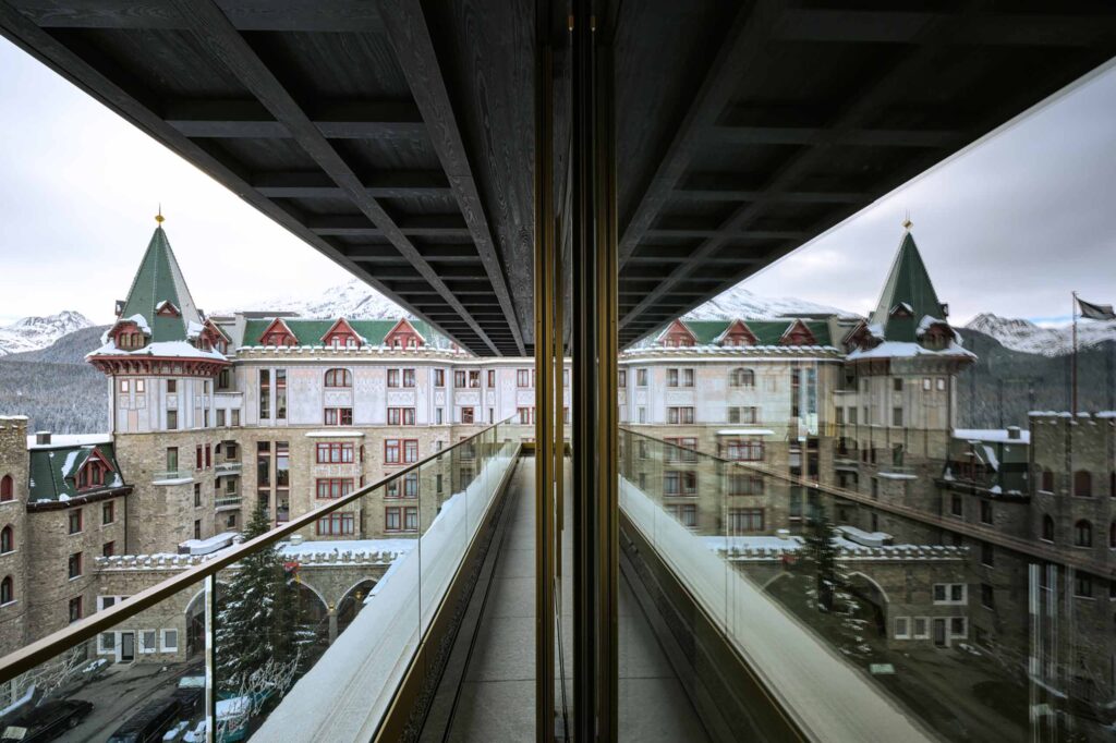 The exterior of Badrutt's Palace Hotel in St Moritz mirrored a window of its Serlas Wing