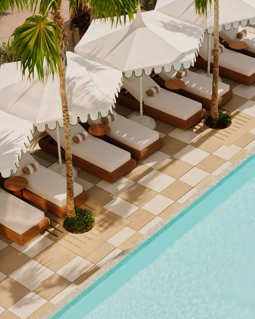 Aerial view of sunloungers poolside at Delano Miami Beach