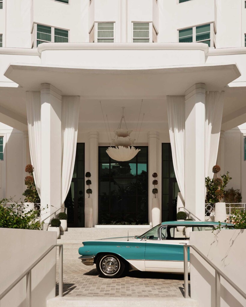Entrance porch to the Delano Miami Beach, complete with blue and white classic car