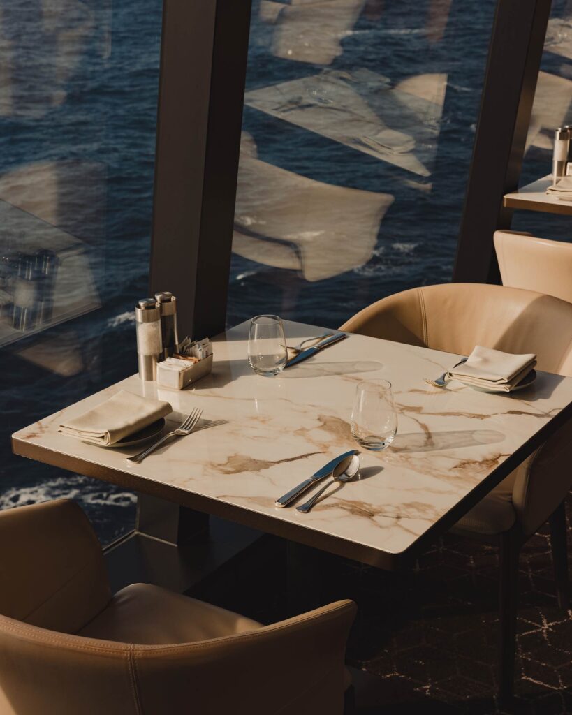 Dining table set for two with sea view