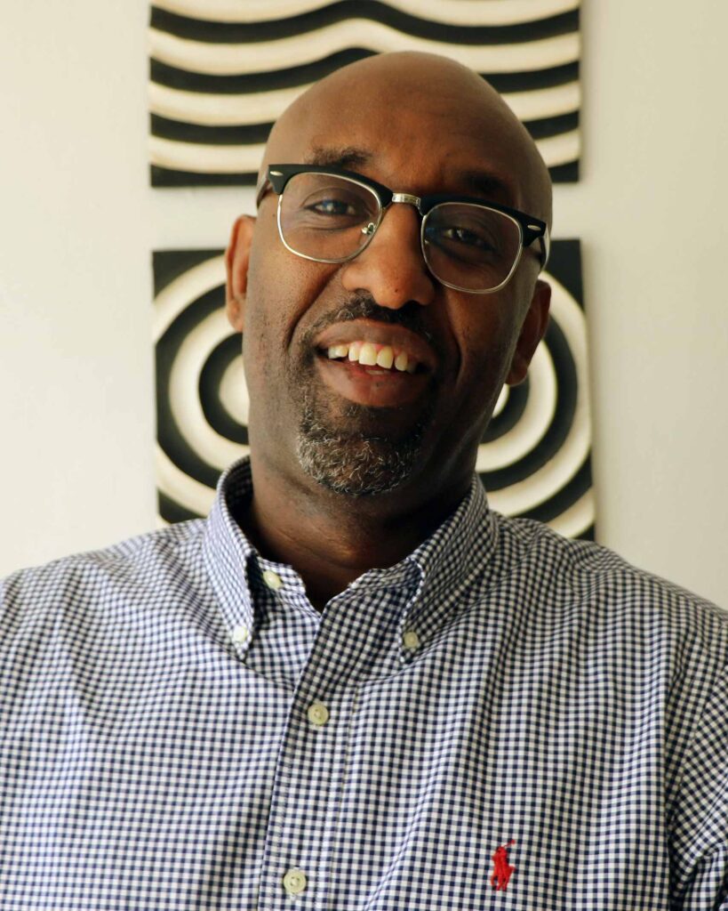 Portrait of Manzi Kayihura, Executive Director of Wilderness Rwanda