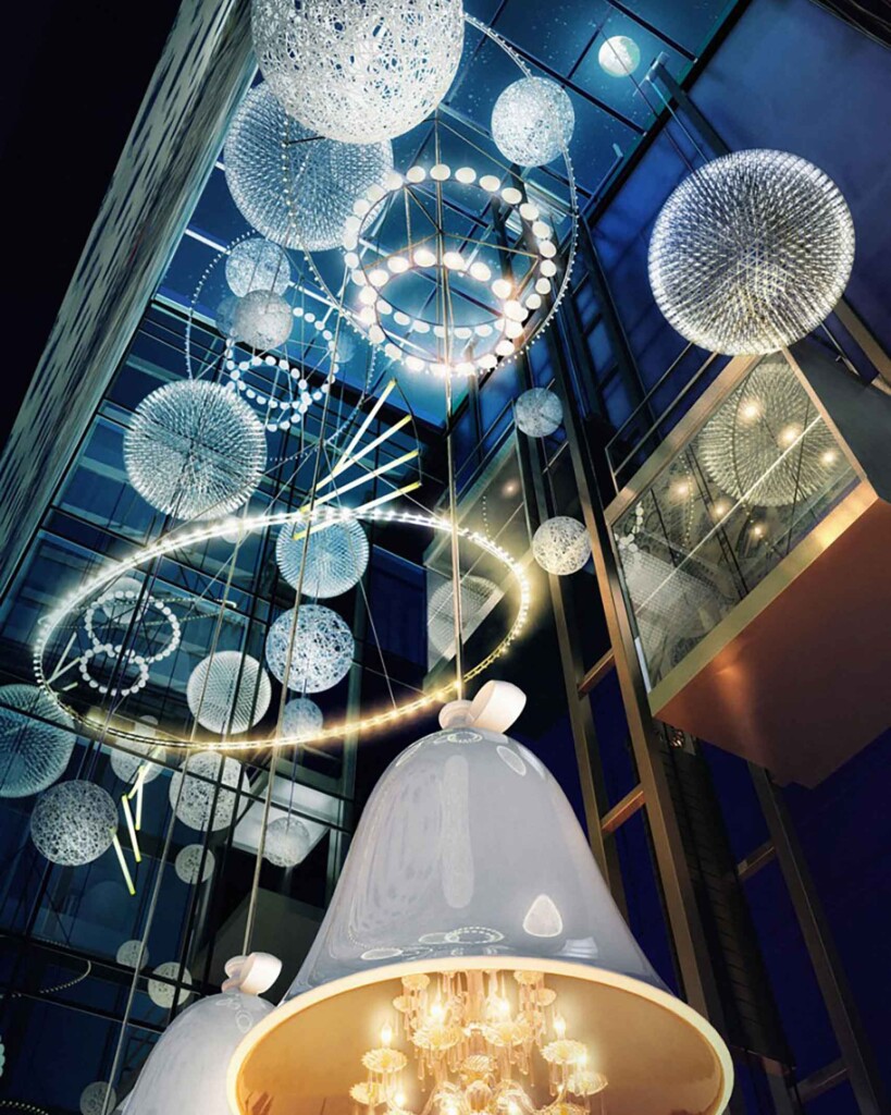 Looking upwards from the lobby at the Andaz Amsterdam Prinsengracht reveals more contemporary lighting recessed into an atrium
