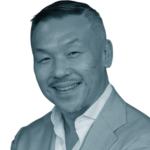 Portrait cut out of Kelly Teo, tinted blue. Kelly is an Asian man with short hair, moustache and a big smile.