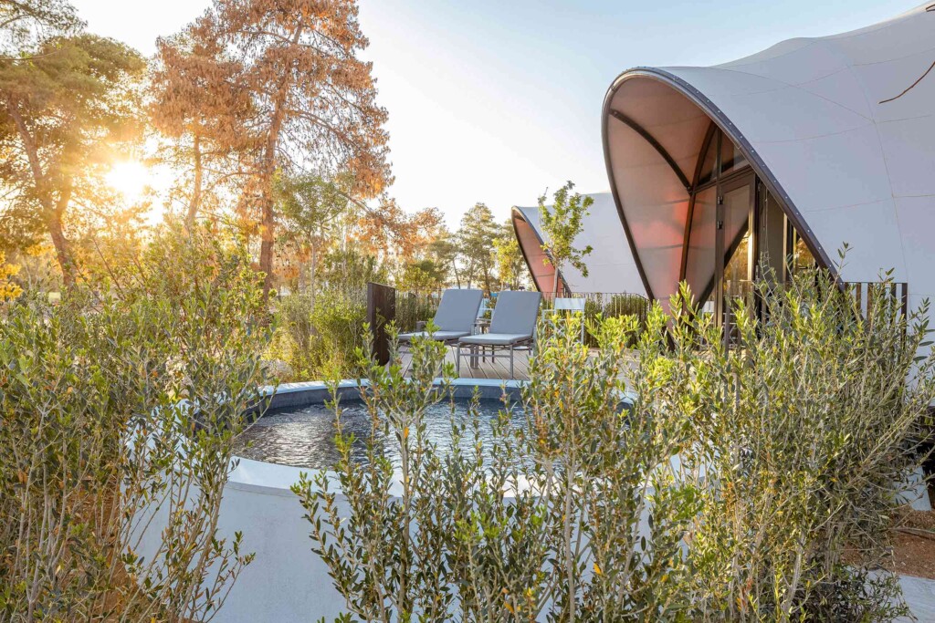 Plunge pool by domed Luxtents at 91 Athens Riviera bask in the sunset